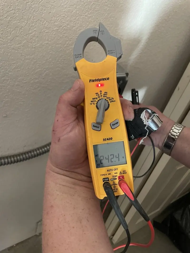 Voltage testing with clamp meter during Hot Tub / Pool Electrical Wiring in Dannemora